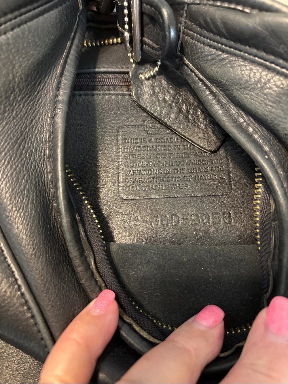 Coach sleek black
